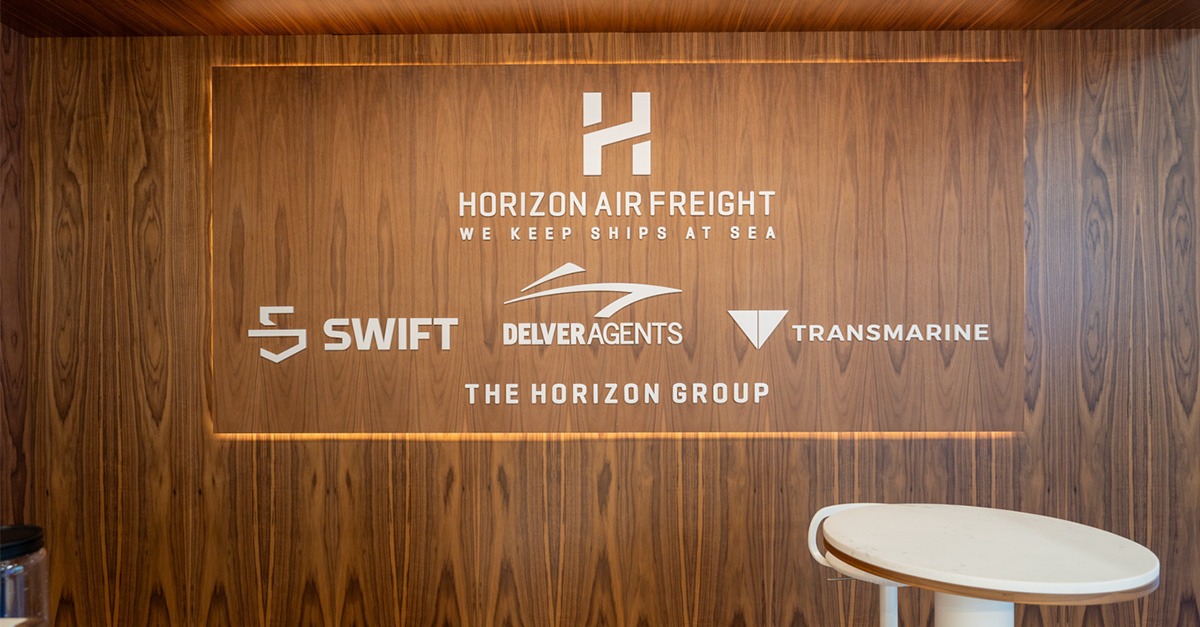 A wall at 2024 Posidonia showing the Horizon Air Group logos.